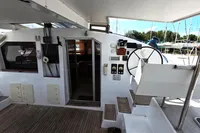 Cockpit of 2015 Flash Cat 52S yacht with steering wheel and control panel.