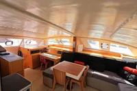 Interior of 2015 Flash Cat 52S yacht with modern seating and navigation area.