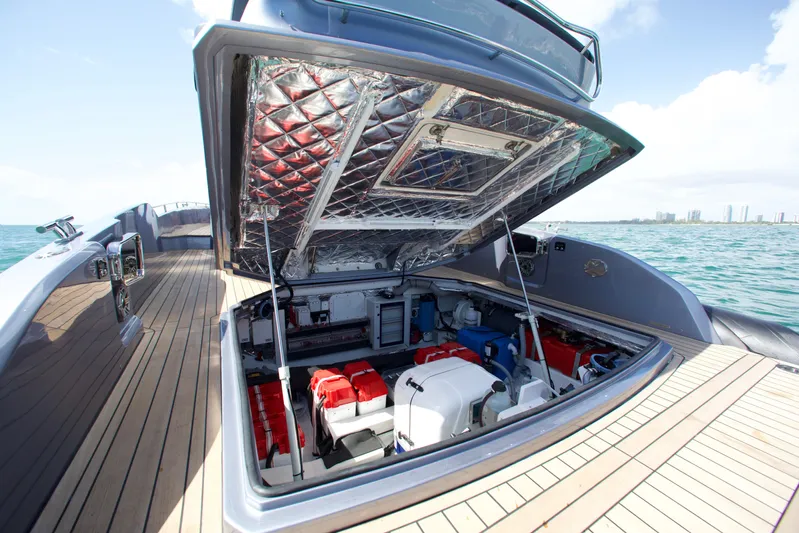  Yacht Photos Pics Open engine compartment of 2022 SACS 47 Rebel yacht on water.