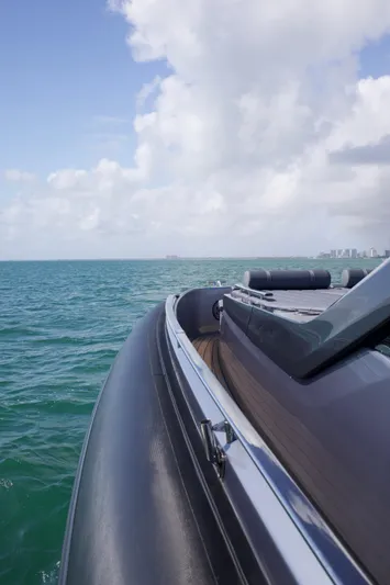  Yacht Photos Pics SACS 47 Rebel 2022 yacht cruising on open sea under cloudy sky.