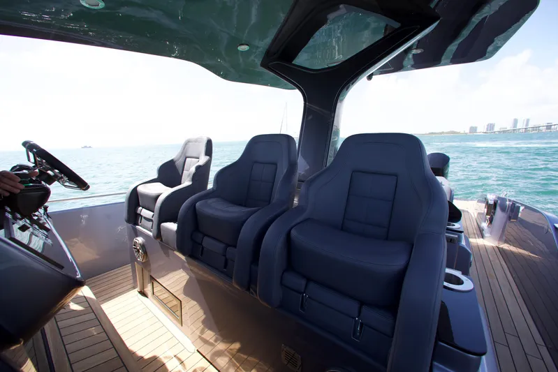  Yacht Photos Pics Luxury interior of 2022 SACS 47 Rebel yacht with plush seating.