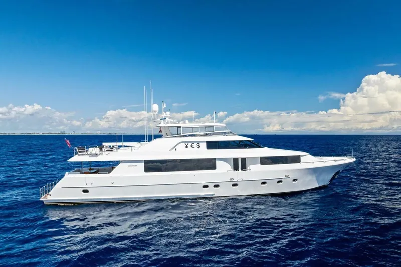 Yes Yacht Photos Pics Luxurious 2011 Westport yacht cruising on open ocean under clear blue skies.