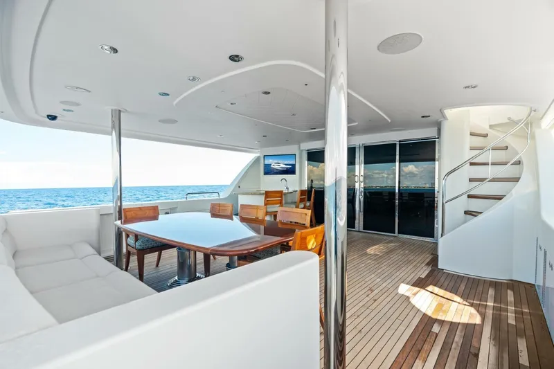 Yes Yacht Photos Pics Luxurious 2011 Westport yacht deck with elegant seating, dining area, and ocean view.