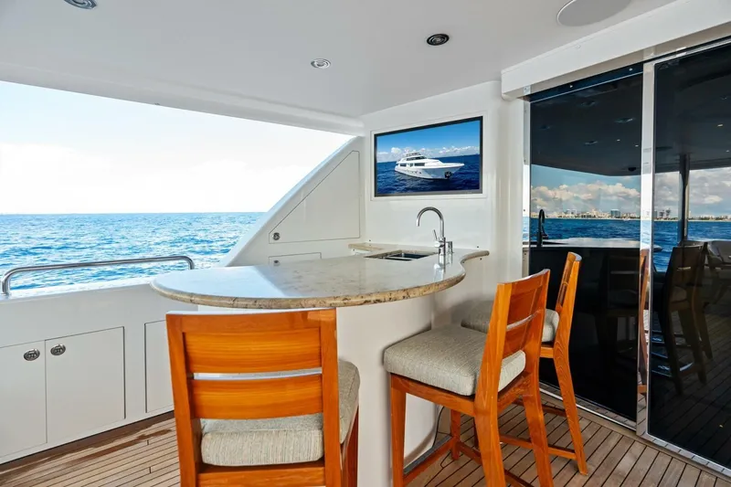 Yes Yacht Photos Pics Luxurious 2011 Westport yacht interior with bar, ocean view, and modern amenities.