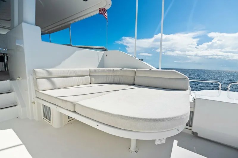 Yes Yacht Photos Pics Luxurious seating area on 2011 Westport yacht with ocean view and clear blue sky.