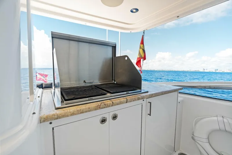 Yes Yacht Photos Pics Outdoor grill on 2011 Westport yacht with ocean view and flags.