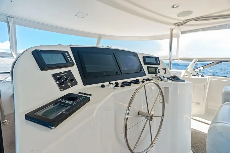 Yes Yacht Photos Pics Luxurious 2011 Westport yacht helm with modern navigation equipment and ocean view.