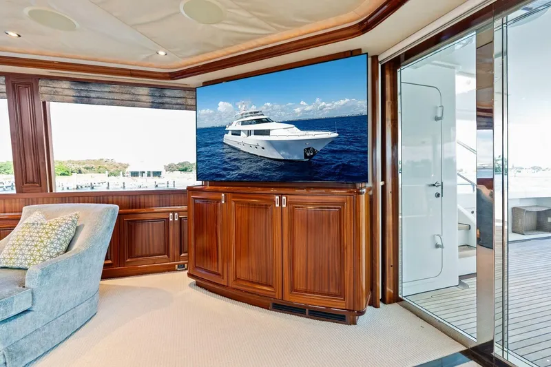 Yes Yacht Photos Pics Luxurious yacht interior with wooden cabinetry, featuring a Westport 2011 model on a screen.
