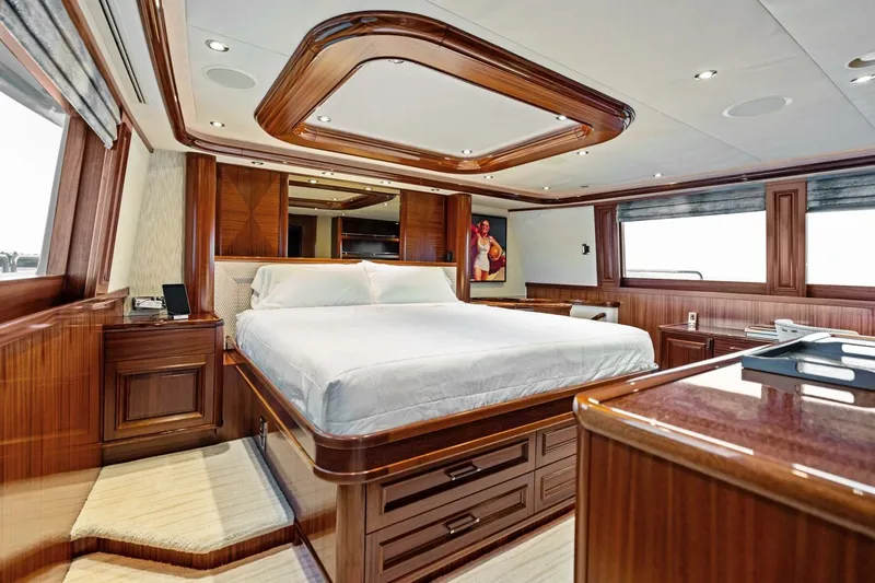 Yes Yacht Photos Pics Luxurious 2011 Westport yacht bedroom with elegant wood finishes and large windows.