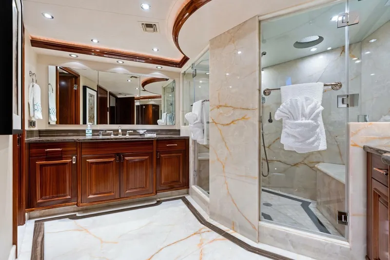 Yes Yacht Photos Pics Luxurious 2011 Westport yacht bathroom with marble accents and elegant wooden cabinetry.