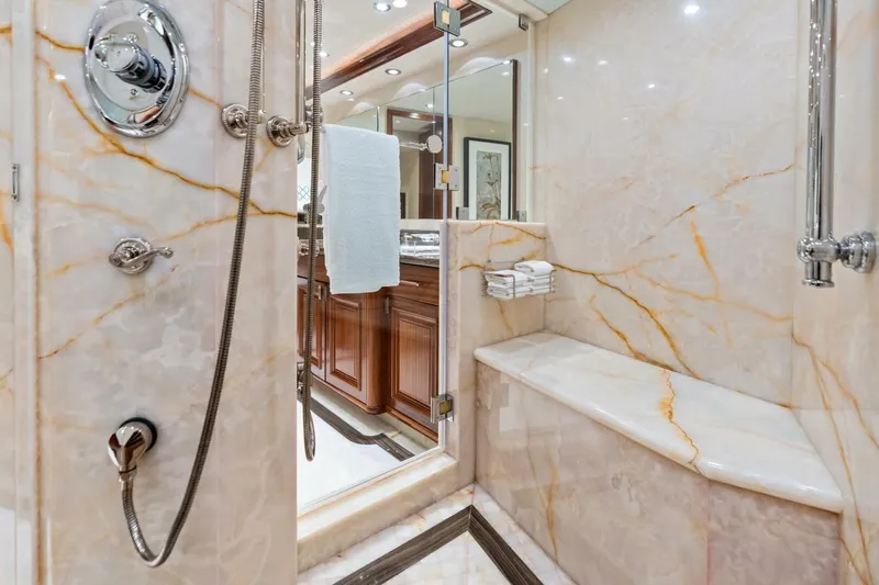 Yes Yacht Photos Pics Luxurious marble shower in 2011 Westport yacht, featuring elegant fixtures and seating.