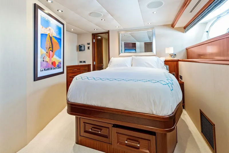 Yes Yacht Photos Pics Luxurious bedroom interior on 2011 Westport yacht, featuring elegant bedding and stylish artwork.