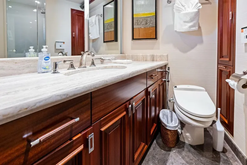 Yes Yacht Photos Pics Luxurious 2011 Westport yacht bathroom with marble countertop and elegant wood cabinetry.