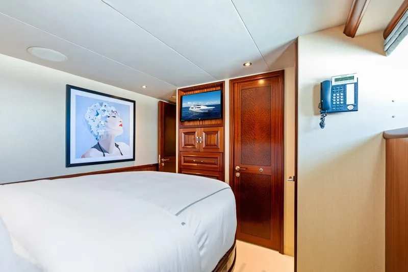 Yes Yacht Photos Pics Luxurious 2011 Westport yacht bedroom with elegant wood finishes and modern artwork.