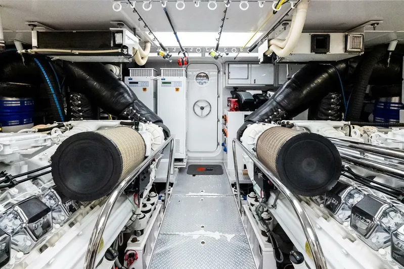 Yes Yacht Photos Pics Engine room of a 2011 Westport yacht, featuring dual engines and advanced equipment.