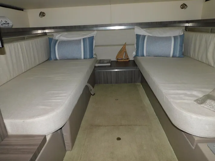 Not Guilty Yacht Photos Pics 2018 Sea Ray Sundancer cabin with twin beds and nautical decor.