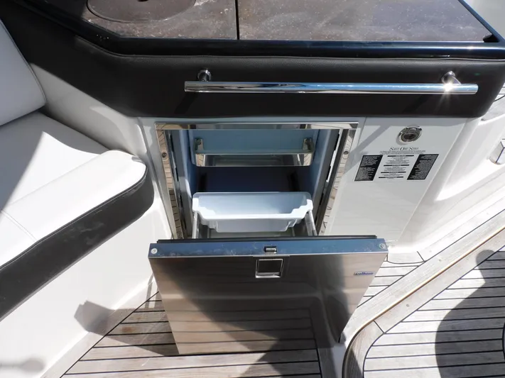 Not Guilty Yacht Photos Pics Built-in refrigerator on a 2018 Sea Ray Sundancer yacht.