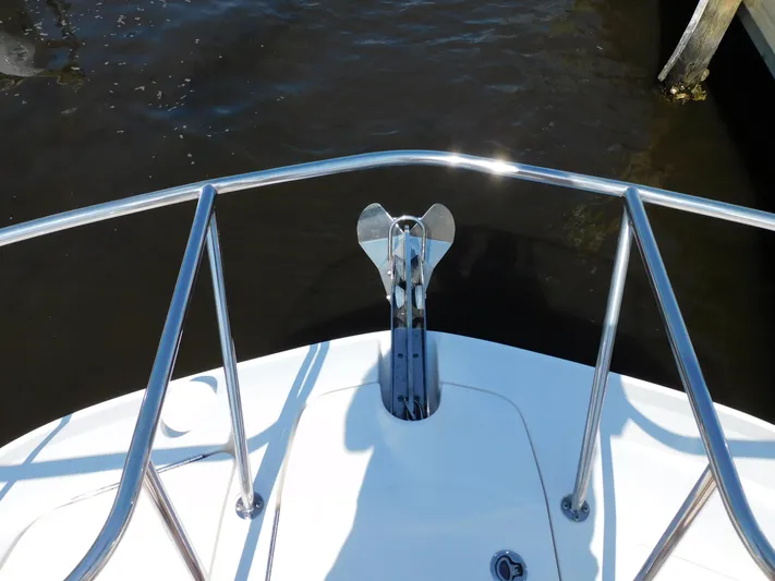 Not Guilty Yacht Photos Pics Bow of a 2018 Sea Ray Sundancer with anchor and stainless steel railings.