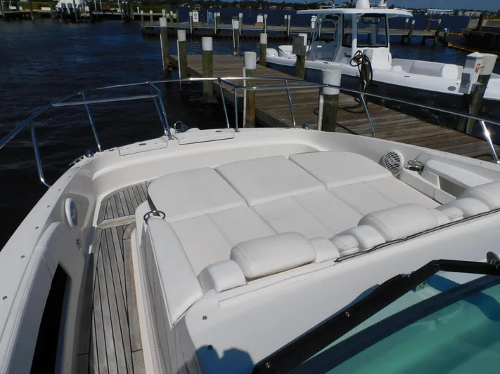 Not Guilty Yacht Photos Pics 2018 Sea Ray Sundancer yacht with spacious sunbathing area docked at marina.