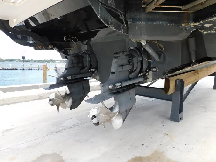 Not Guilty Yacht Photos Pics 2018 Sea Ray Sundancer boat propellers and stern drives on a dock.