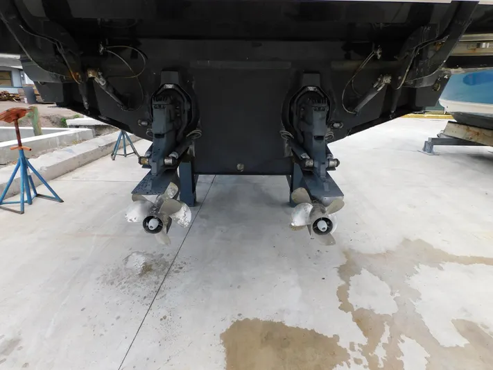 Not Guilty Yacht Photos Pics 2018 Sea Ray Sundancer boat propellers and stern drive in dry dock.