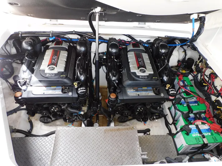 Not Guilty Yacht Photos Pics Engine compartment of a 2018 Sea Ray Sundancer with twin engines and batteries.