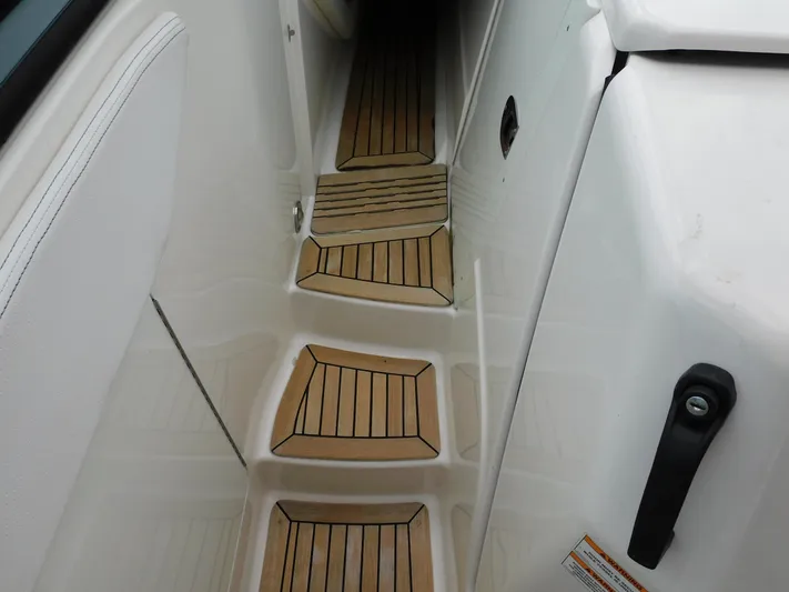 Not Guilty Yacht Photos Pics 2018 Sea Ray Sundancer boat interior with teak steps.