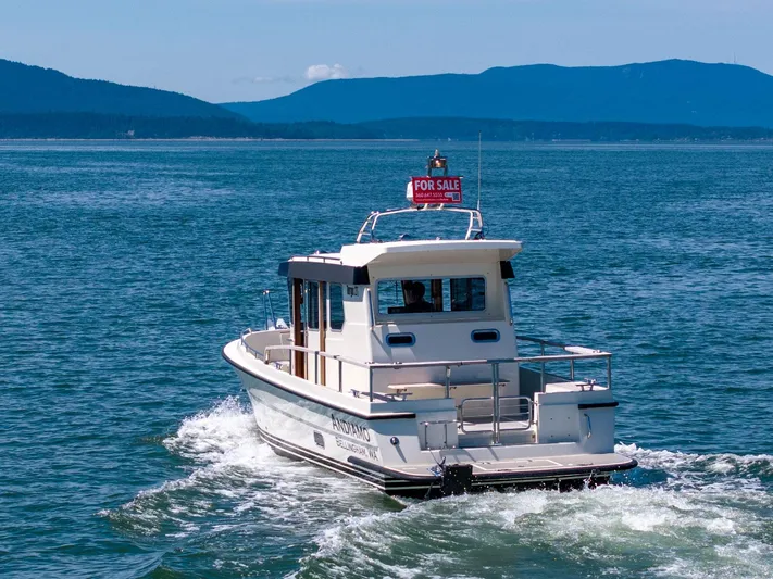  Yacht Photos Pics 2019 Targa 27.2 boat for sale cruising on open water.