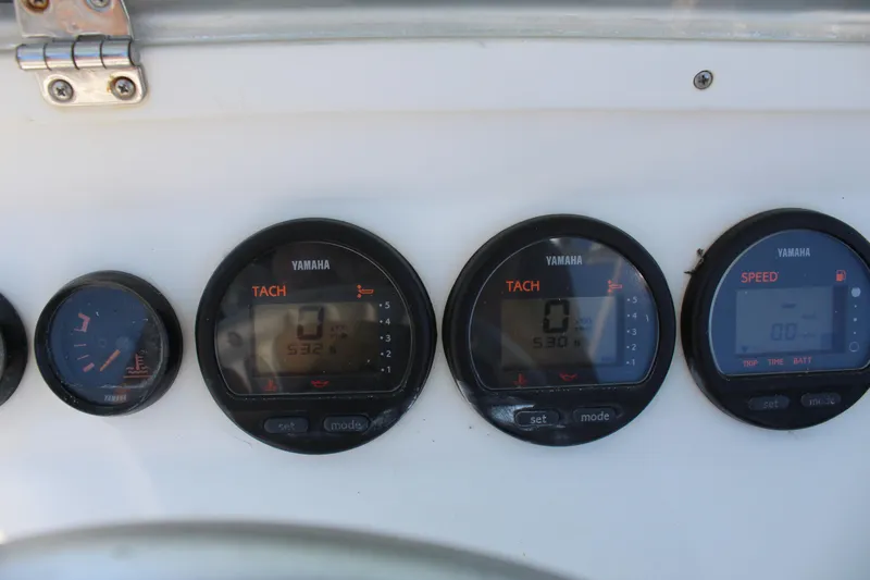  Yacht Photos Pics Yamaha gauges on a 2002 Contender 31 CC boat dashboard.