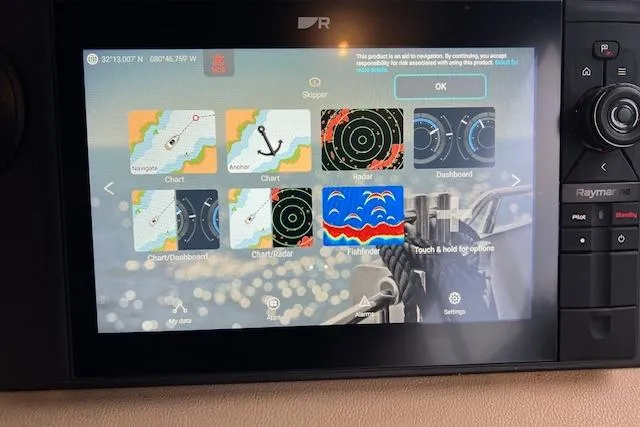  Yacht Photos Pics Touchscreen navigation display on 2017 Sea Ray Sundancer 400 boat, showing charts and radar options.