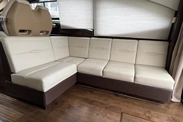  Yacht Photos Pics Luxurious interior seating of 2017 Sea Ray Sundancer 400 yacht with cream upholstery.