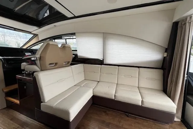  Yacht Photos Pics Luxurious interior of 2017 Sea Ray Sundancer 400 yacht with plush seating.