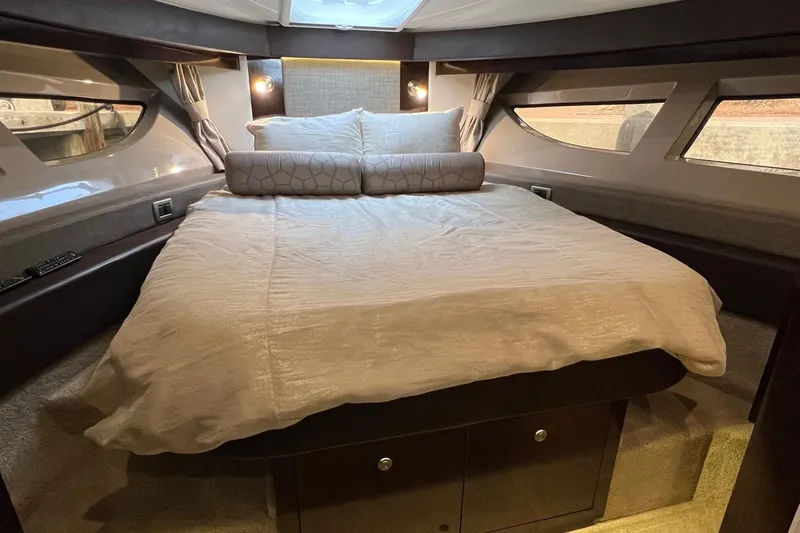  Yacht Photos Pics Luxurious cabin interior of 2017 Sea Ray Sundancer 400 yacht with cozy bedding.