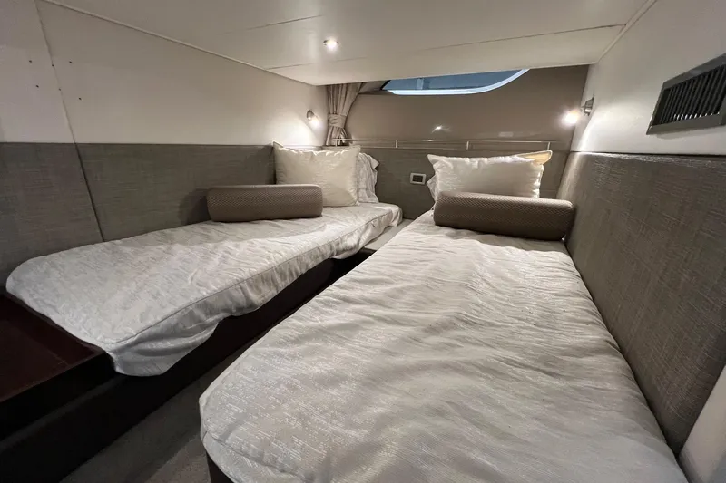  Yacht Photos Pics Interior cabin of 2017 Sea Ray Sundancer 400 with twin beds and modern decor.