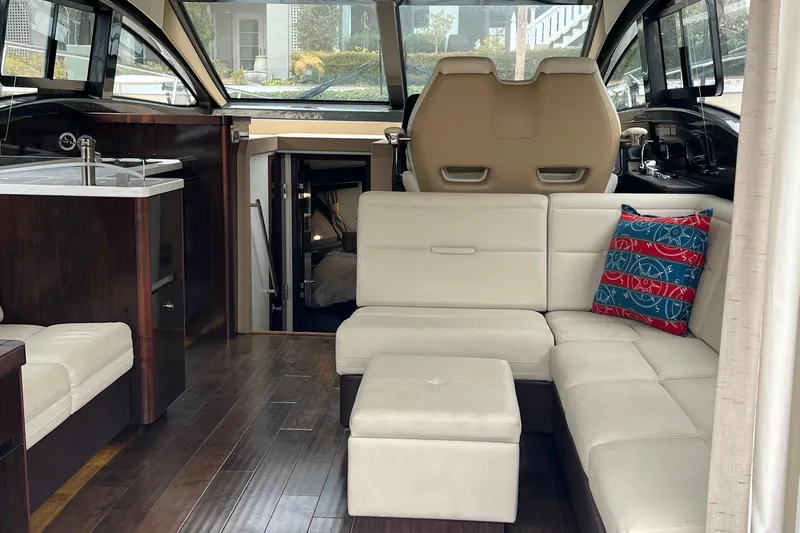  Yacht Photos Pics Luxurious interior of 2017 Sea Ray Sundancer 400 yacht with modern seating and decor.