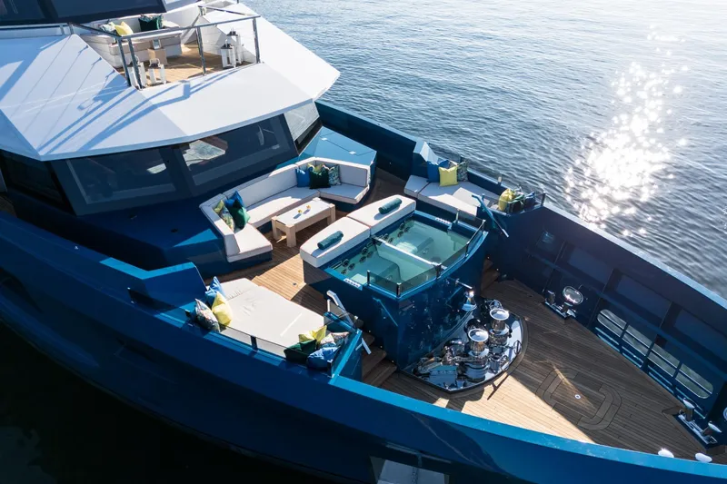 King Benji Yacht Photos Pics Luxurious 2024 Dunya Yachts Explorer with spacious deck and elegant seating area.