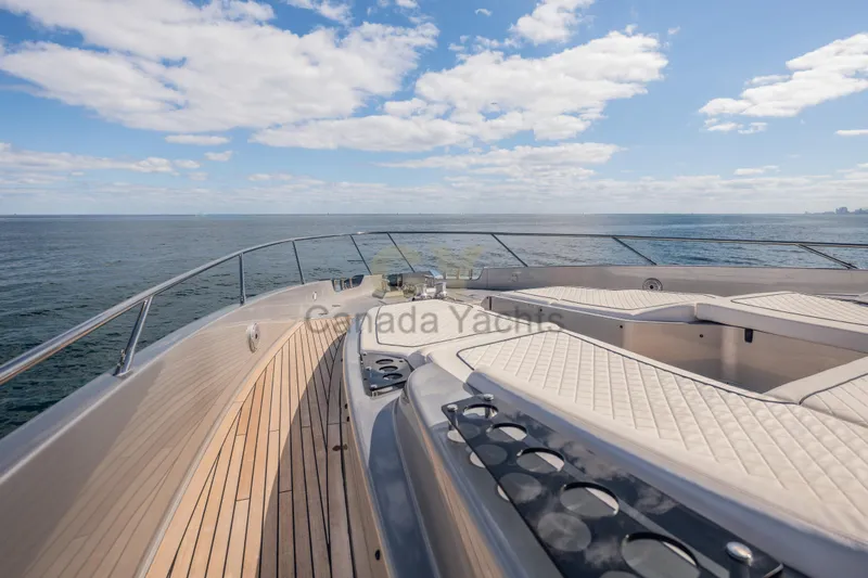 Allora Yacht Photos Pics Luxurious 2026 Riva 82' Diva yacht deck with ocean view and elegant seating.