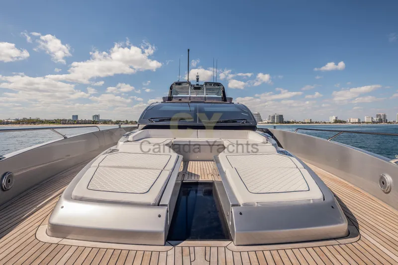 Allora Yacht Photos Pics Luxury 2026 Riva 82' Diva yacht deck with sun loungers, ocean view.