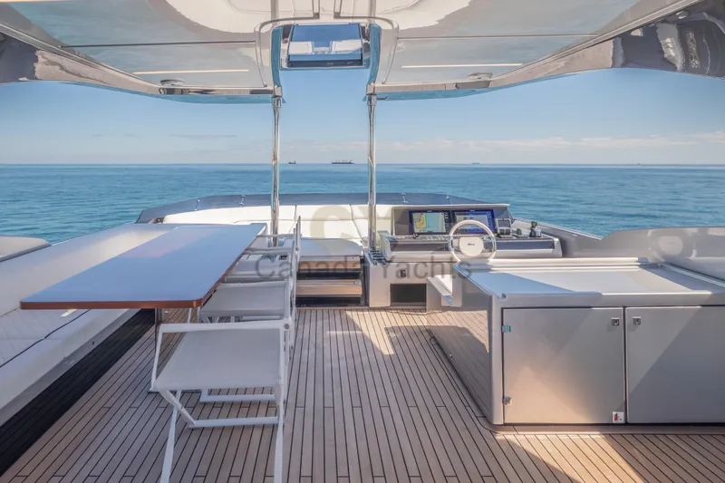 Allora Yacht Photos Pics Luxurious 2026 Riva 82' Diva yacht deck with ocean view and modern amenities.