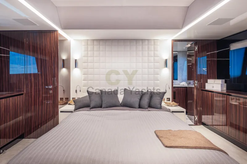 Allora Yacht Photos Pics Luxurious bedroom interior of 2026 Riva 82' Diva yacht with modern design elements.