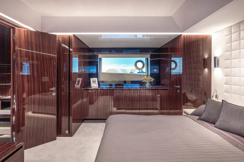 Allora Yacht Photos Pics Luxurious interior of 2026 Riva 82' Diva yacht with elegant wood paneling and modern decor.