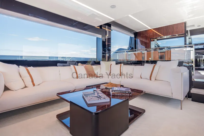 Allora Yacht Photos Pics Luxurious interior of 2026 Riva 82' Diva yacht with elegant seating and panoramic views.