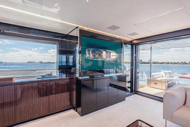 Allora Yacht Photos Pics Luxurious interior of 2026 Riva 82' Diva yacht with ocean view and modern furnishings.