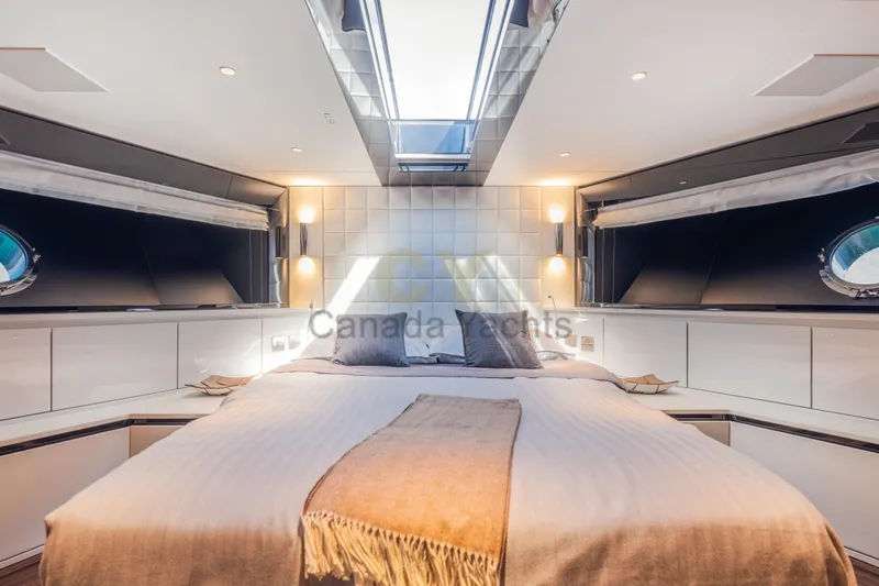 Allora Yacht Photos Pics Luxurious bedroom interior of 2026 Riva 82' Diva yacht with modern design.