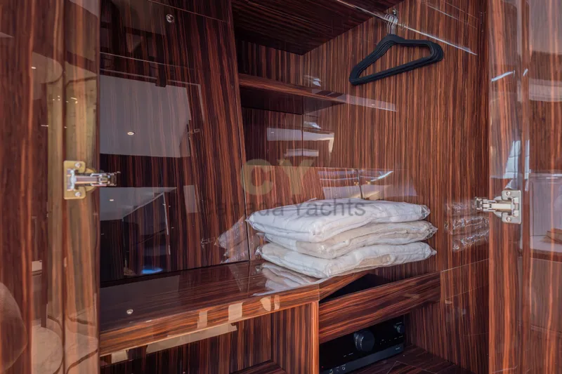 Allora Yacht Photos Pics Luxurious wooden closet interior on 2026 Riva 82' Diva yacht.