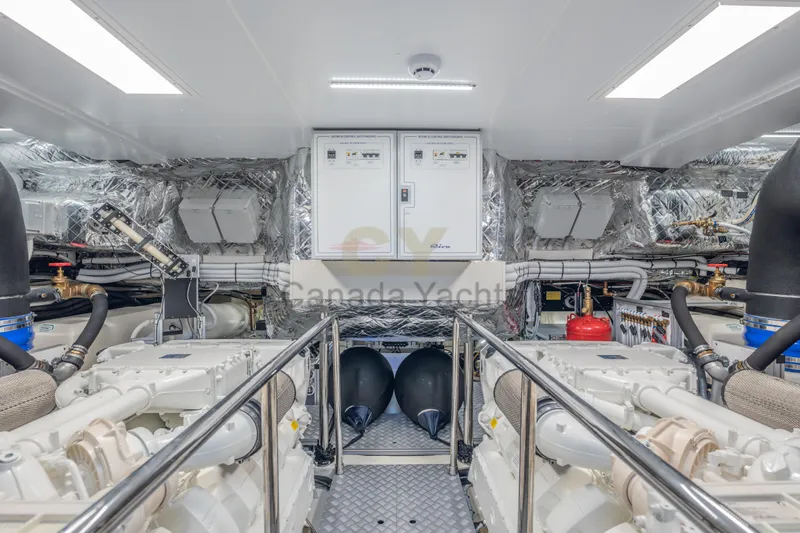 Allora Yacht Photos Pics Engine room of 2026 Riva 82' Diva yacht, showcasing advanced machinery and control systems.