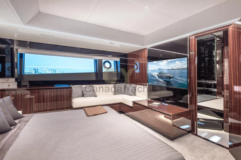 Allora Yacht Photos Pics Luxurious interior of 2026 Riva 82' Diva yacht with modern furnishings and large windows.