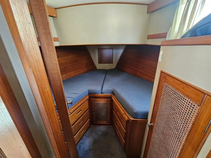 Marytime Yacht Photos Pics 1987 Grand Banks 42 Europa cabin with wooden interior and twin beds.