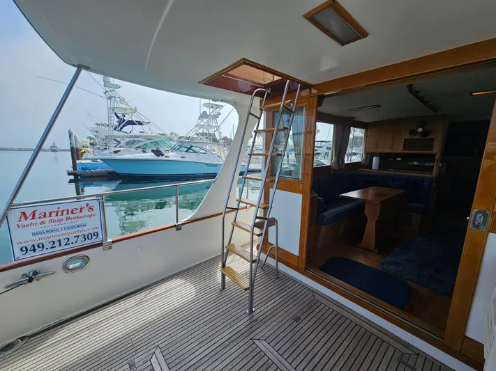 Marytime Yacht Photos Pics Grand Banks 42 Europa yacht interior with wooden finish, docked at marina, 1987 model.