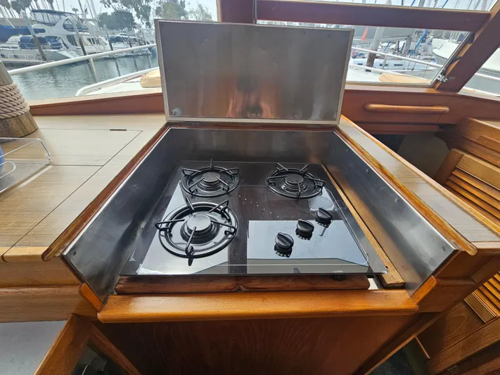 Marytime Yacht Photos Pics Gas stove on 1987 Grand Banks 42 Europa yacht, docked at marina.